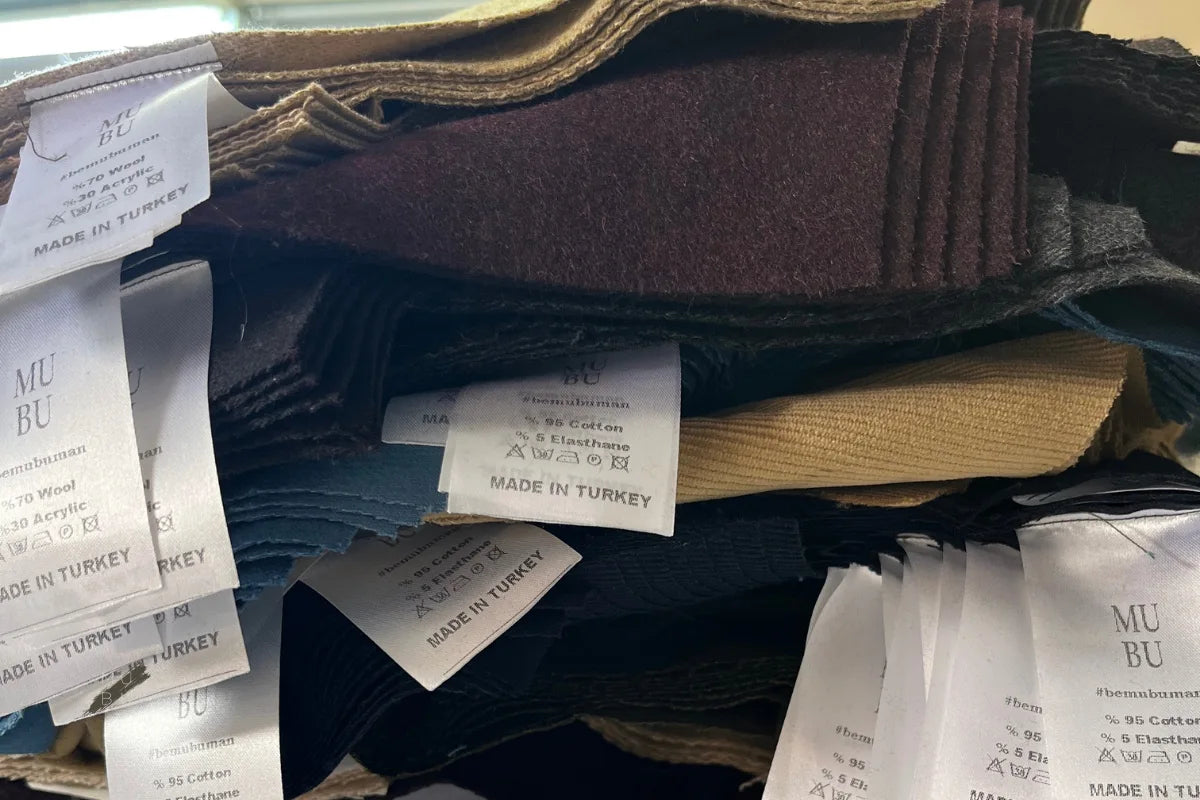 MUBU personel kıyafeti kumaş içerik etiketleri, Türkiye üretimi.